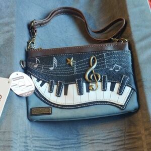 Chala Brown and Blue Music-Themed Clutch